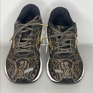 Brooks Black and Gold Ny Sneakers